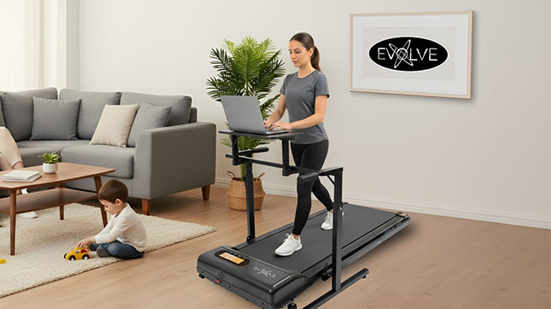 A person walks on a treadmill with a laptop while a child plays.