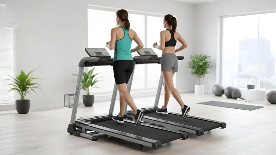 Two people running on treadmills in a bright, modern gym.