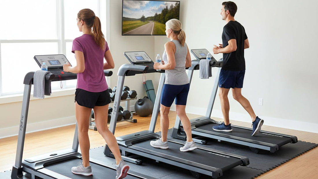 Three people running on treadmills in a home gym.